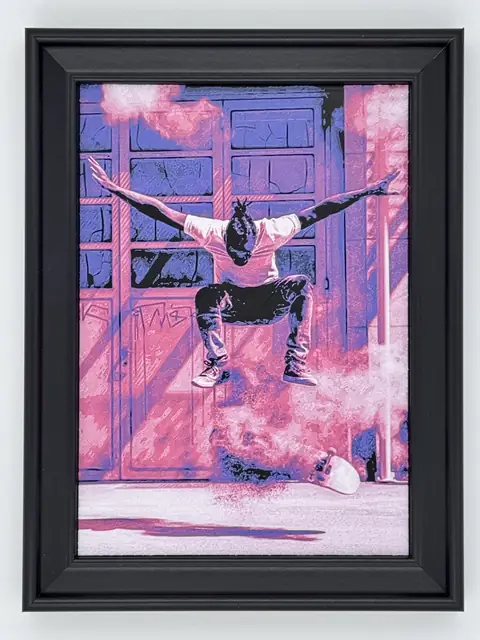 Finished framed 3D photo relief with a skateboard jump scene.